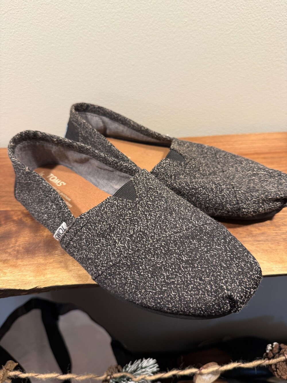 Toms charcoal and black slip on shoes size 7